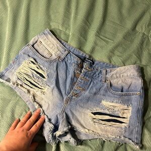 Distressed Light Blue Denim Shorts